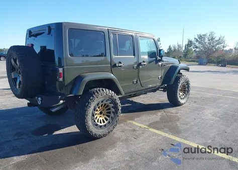 2015 Jeep Wrangler Unlimited Sport z USA, uszkodzony, nr VIN 1C4BJWDG4FL742392